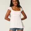 Easy satijnen babydolltop met strik Easy satijnen babydolltop met strik
