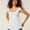 Easy satijnen babydolltop met strik Easy satijnen babydolltop met strik