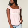 Easy satijnen babydolltop met strik Easy satijnen babydolltop met strik