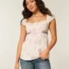 Easy satijnen babydolltop met strik Easy satijnen babydolltop met strik
