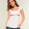 Easy satijnen babydolltop met strik Easy satijnen babydolltop met strik