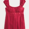 Easy satijnen babydolltop met strik Easy satijnen babydolltop met strik