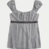 Easy satijnen babydolltop met strik Easy satijnen babydolltop met strik