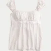 Easy satijnen babydolltop met strik Easy satijnen babydolltop met strik