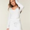 Fleece jurk met capuchon en lange mouwen Fleece jurk met capuchon en lange mouwen