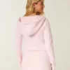 Fleece jurk met capuchon en lange mouwen Fleece jurk met capuchon en lange mouwen