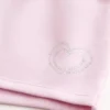 Fleece minishort met hartjesprint Fleece minishort met hartjesprint