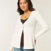 Flyaway babydoll-vest met lange mouwen Flyaway babydoll-vest met lange mouwen