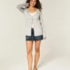 Flyaway babydoll-vest met lange mouwen Flyaway babydoll-vest met lange mouwen