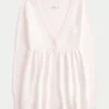 Flyaway babydoll-vest met lange mouwen Flyaway babydoll-vest met lange mouwen