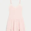 Gebreide mini-jurk met laagjes