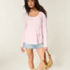 Gemakkelijke babydolltop met bloemenpatroon en lange mouwen Gemakkelijke babydolltop met bloemenpatroon en lange mouwen