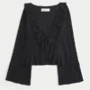 Gemakkelijke babydolltop met lange mouwen en ruches Gemakkelijke babydolltop met lange mouwen en ruches