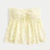 Gemakkelijke strapless babydolltop met gesmokte buste Gemakkelijke strapless babydolltop met gesmokte buste