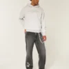 Gewassen zwarte baggy jeans met sterprint Gewassen zwarte baggy jeans met sterprint
