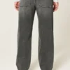 Gewassen zwarte baggy jeans met sterprint Gewassen zwarte baggy jeans met sterprint