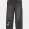 Gewassen zwarte baggy jeans met sterprint Gewassen zwarte baggy jeans met sterprint