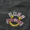 Gewassen zwarte Good Luck geborduurde skater baggy jeans Gewassen zwarte Good Luck geborduurde skater baggy jeans