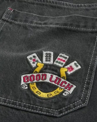 Gewassen zwarte Good Luck geborduurde skater baggy jeans