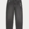 Gewassen zwarte skaterbaggyjeans met jokerprint Gewassen zwarte skaterbaggyjeans met jokerprint