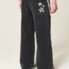 Gewassen zwarte Super Baggy Jeans met sterrenprint Gewassen zwarte Super Baggy Jeans met sterrenprint