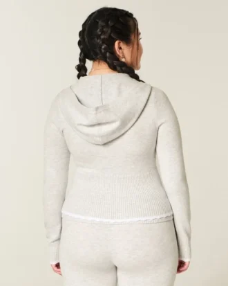 Gilly Hicks Sweater met capuchon en geschulpte zoom Gilly Hicks Sweater met capuchon en geschulpte zoom