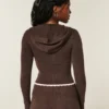 Gilly Hicks Sweater met capuchon en geschulpte zoom