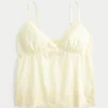 Glanzende geborduurde babydolltop Glanzende geborduurde babydolltop