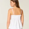 Glanzende geborduurde babydolltop Glanzende geborduurde babydolltop