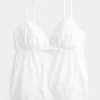 Glanzende geborduurde babydolltop Glanzende geborduurde babydolltop