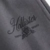 Glitterend logo-ontwerp Sweatpants met wijde pijpen Glitterend logo-ontwerp Sweatpants met wijde pijpen