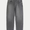 Grijze skaterbaggyjeans met borduursels en studs Grijze skaterbaggyjeans met borduursels en studs