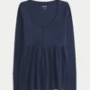 Henley babydoll top met strikbandjes Henley babydoll top met strikbandjes