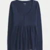 Henley babydoll top met strikbandjes Henley babydoll top met strikbandjes