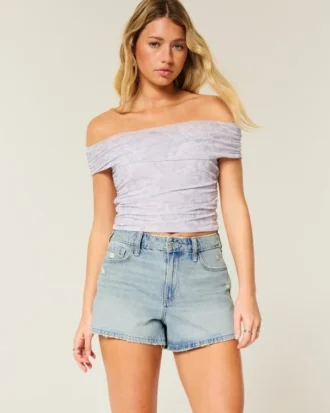 Hoge taille distressed lichtgewassen A-lijn denim shorts