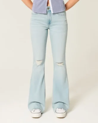 Hoge taille, lichtgewassen flare jeans met scheuren