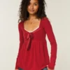 Holiday Vault Release Easy satijnen babydolltop met strik aan de voorkant Holiday Vault Release Easy satijnen babydolltop met strik aan de voorkant