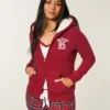Holiday Vault Release Sherpa-gevoerde hoodie met ritssluiting en logo Holiday Vault Release Sherpa-gevoerde hoodie met ritssluiting en logo