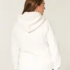Holiday Vault Release Sherpa-gevoerde hoodie met ritssluiting en logo Holiday Vault Release Sherpa-gevoerde hoodie met ritssluiting en logo