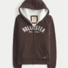 Holiday Vault Release Sherpa-gevoerde hoodie met ritssluiting en logo Holiday Vault Release Sherpa-gevoerde hoodie met ritssluiting en logo