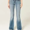 Laag model distressed medium wash bootcut jeans