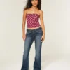 Laag model donkere wassing bootcut jeans met riem Laag model donkere wassing bootcut jeans met riem