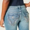 Laag model, medium wassing, geborduurde bloemen, bootcut jeans Laag model, medium wassing, geborduurde bloemen, bootcut jeans