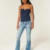 Laag model, medium wassing, geborduurde bloemen, bootcut jeans Laag model, medium wassing, geborduurde bloemen, bootcut jeans