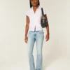 Laag model, medium wassing, geborduurde vlinder bootcut jeans Laag model, medium wassing, geborduurde vlinder bootcut jeans