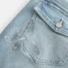 Laag model, medium wassing, geborduurde vlinder bootcut jeans Laag model, medium wassing, geborduurde vlinder bootcut jeans