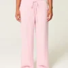 Laag uitgesneden baggy broek met elastische tailleband Laag uitgesneden baggy broek met elastische tailleband