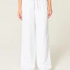 Laag uitgesneden baggy broek met elastische tailleband Laag uitgesneden baggy broek met elastische tailleband