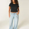 Laag uitgesneden baggy jeans met distressed effect Laag uitgesneden baggy jeans met distressed effect