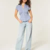 Laag uitgesneden baggy jeans met lichte wassing Laag uitgesneden baggy jeans met lichte wassing